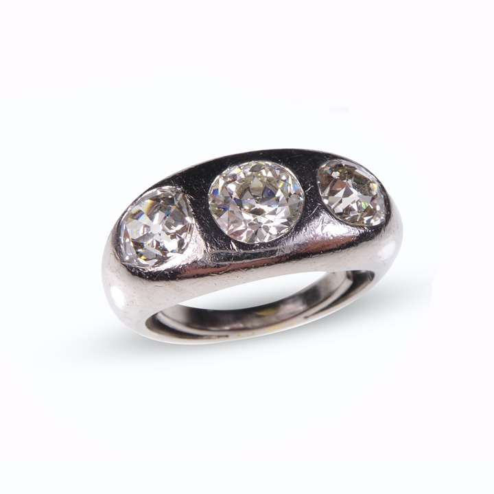 Three stone diamond and platinum bold ring